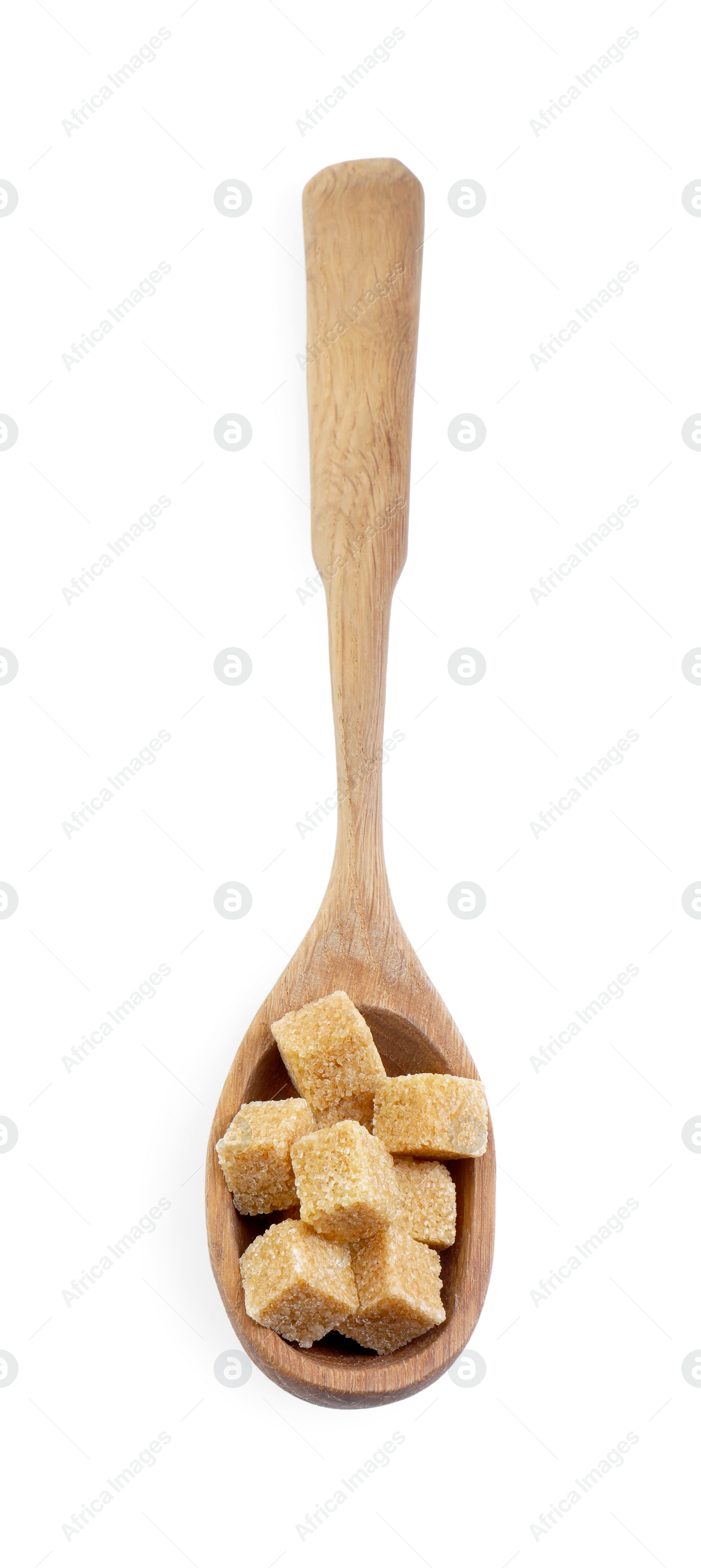 Photo of Brown sugar cubes in wooden spoon isolated on white, top view