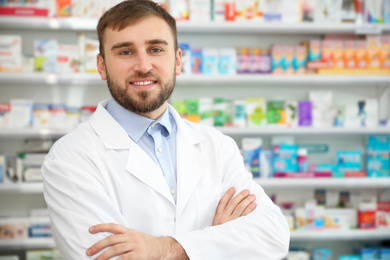 Image of Portrait of professional pharmacist in modern drugstore