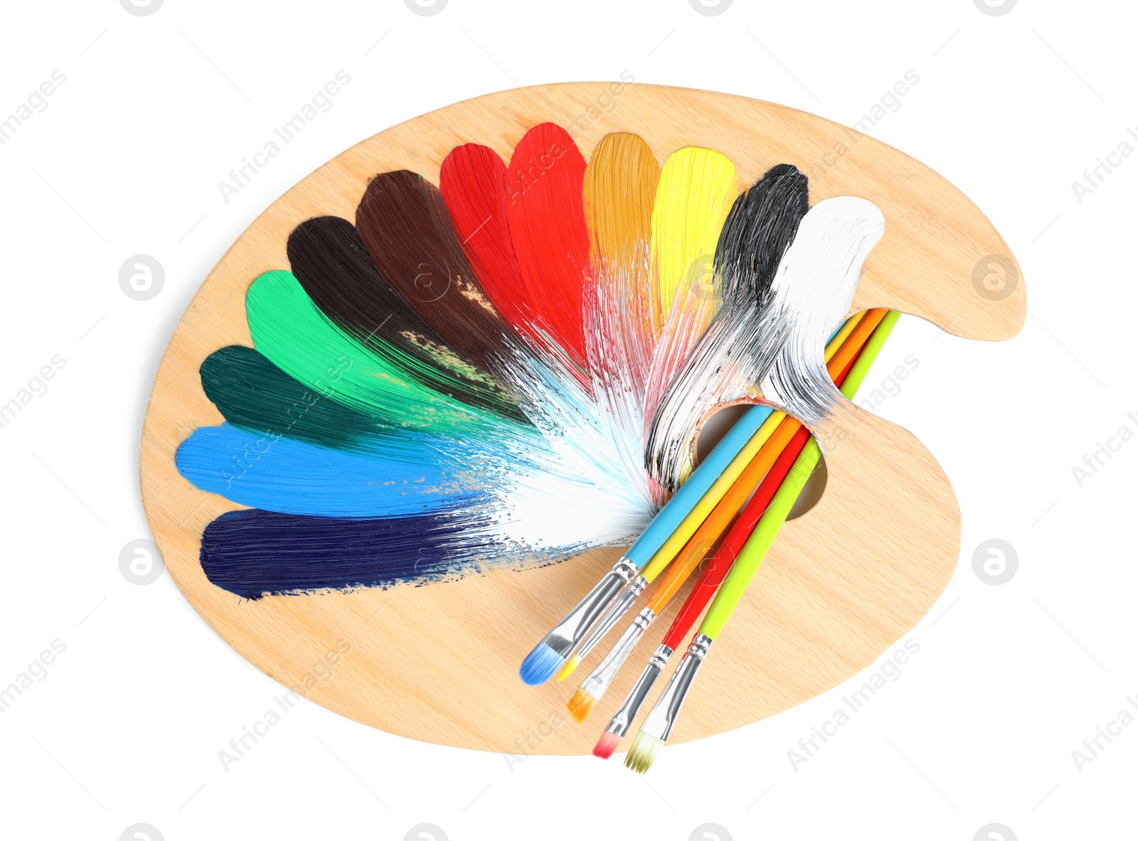 Photo of Palette with paints and brushes on white background, top view. Artist equipment