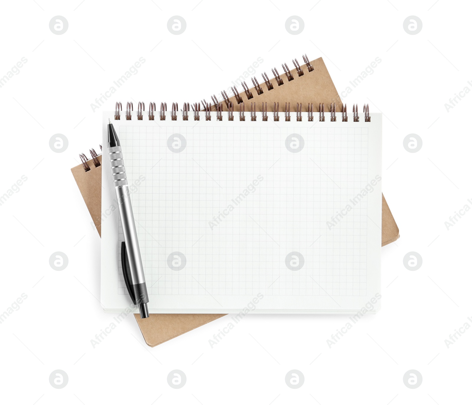 Photo of Two notebooks and pen isolated on white, top view