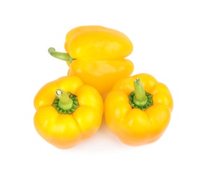 Ripe yellow bell peppers isolated on white, top view