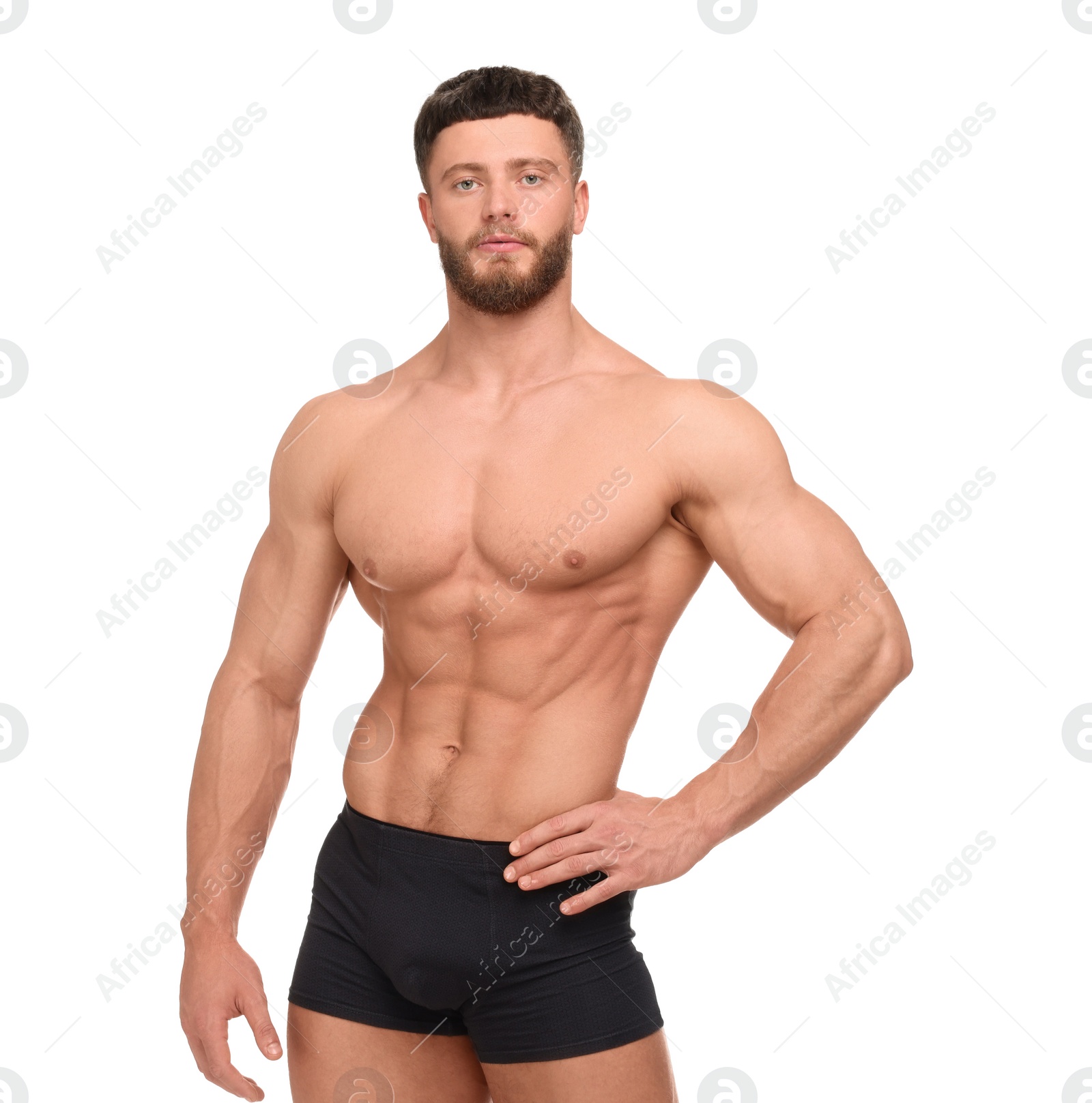 Photo of Handsome muscular man isolated on white. Sexy body