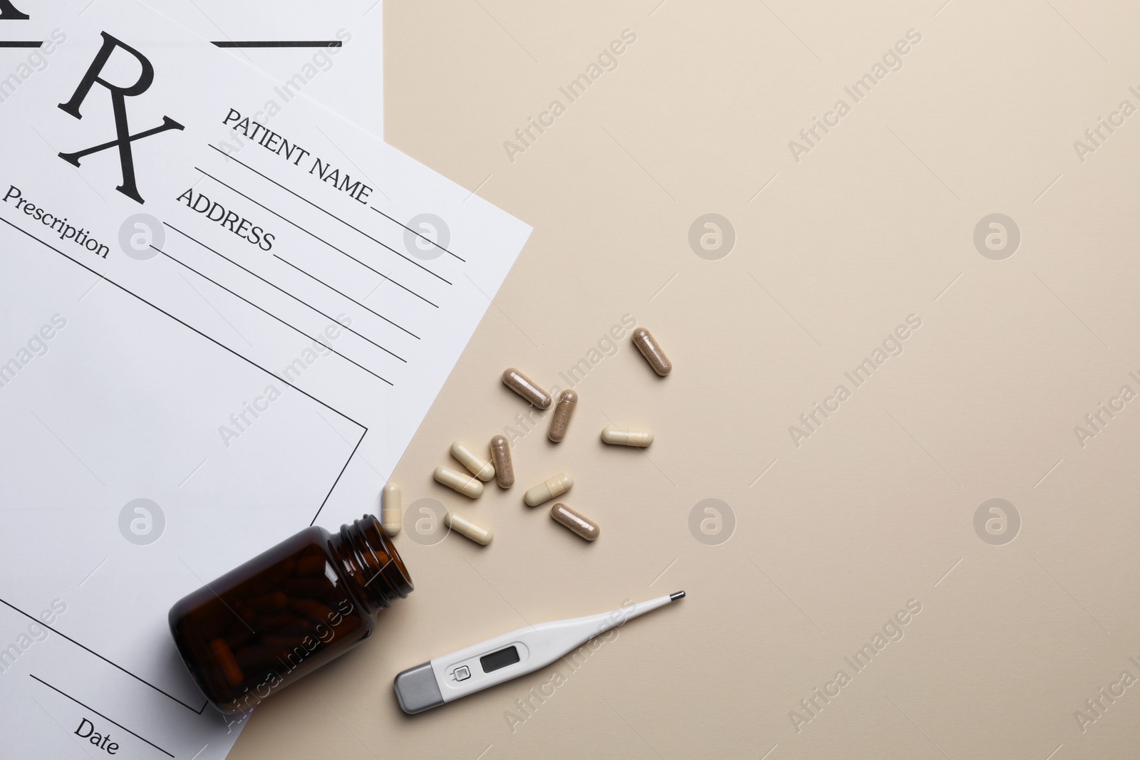 Photo of Medical prescription forms, pills and thermometer on beige background, flat lay. Space for text