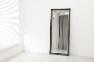 Stylish long mirror in makeup room. Space for text