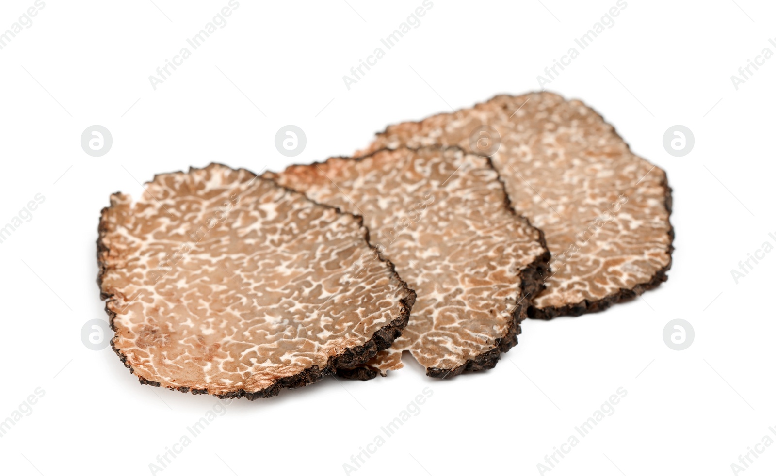 Photo of Slices of black truffle isolated on white