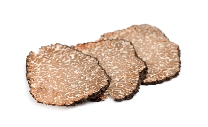 Photo of Slices of black truffle isolated on white