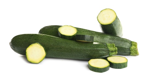 Fresh ripe green zucchinis isolated on white