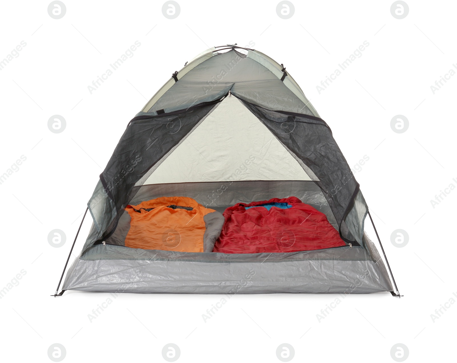 Photo of Comfortable grey camping tent with sleeping bags on white background