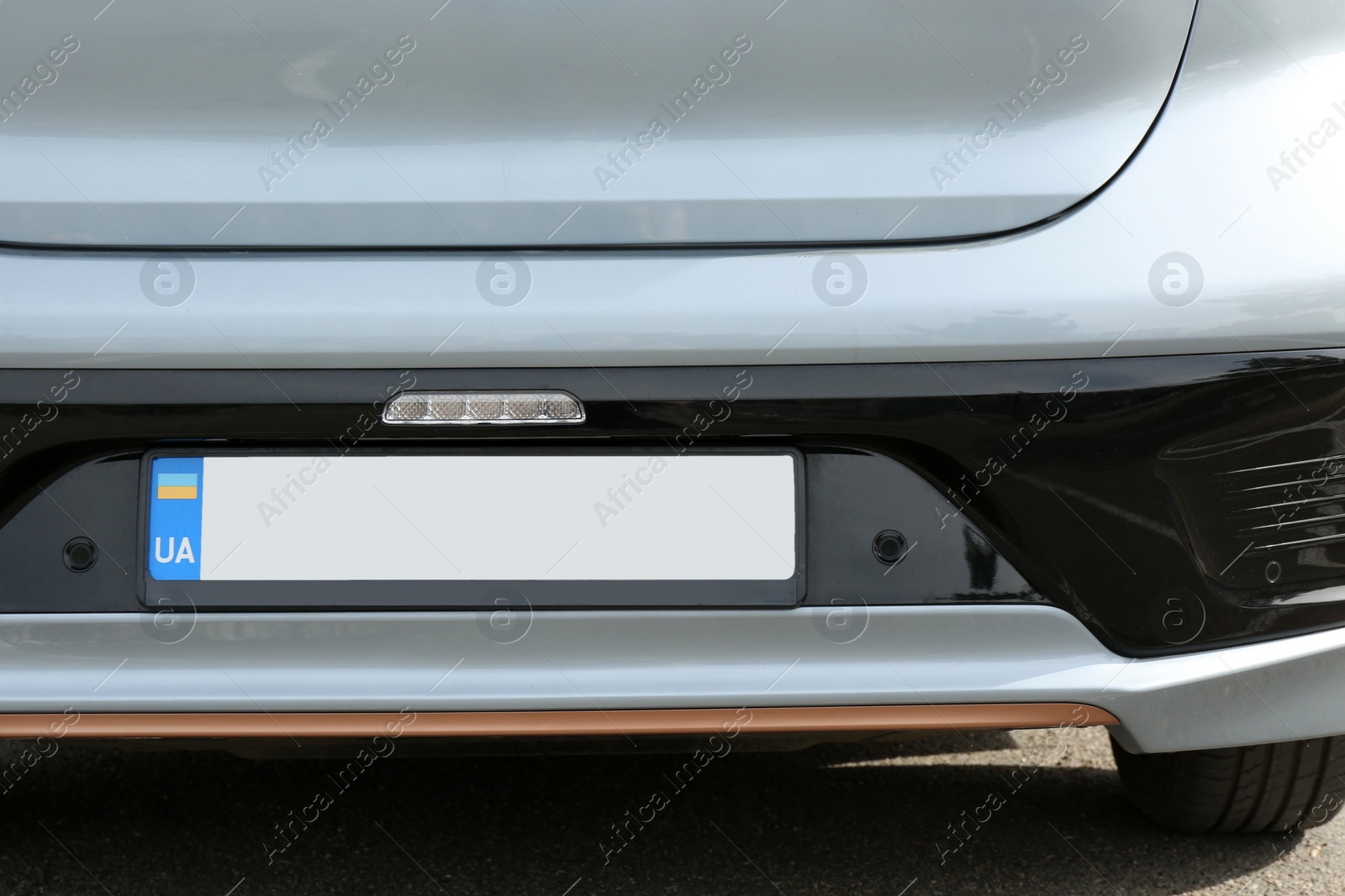 Photo of Car with vehicle registration plate outdoors, closeup