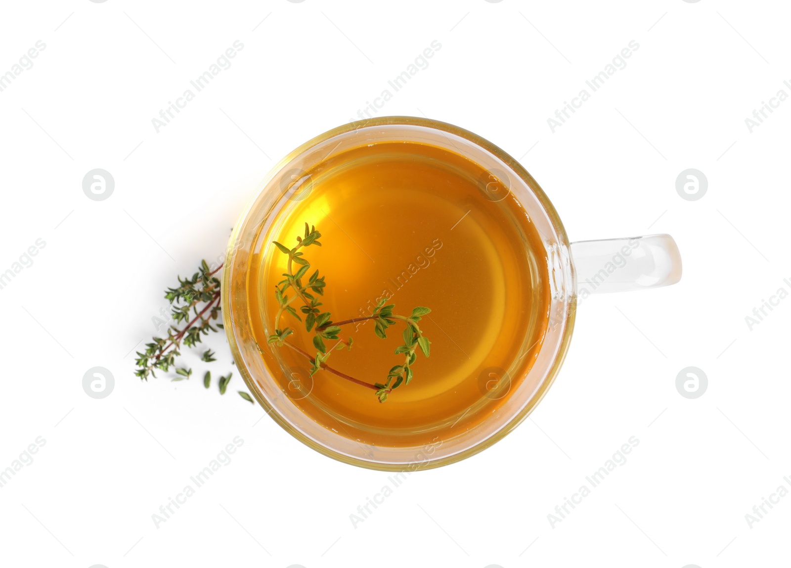 Photo of Aromatic herbal tea with thyme isolated on white, top view