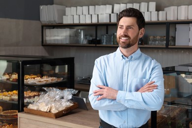 Photo of Portraithappy business owner in bakery shop