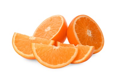 Photo of Cut fresh ripe oranges on white background