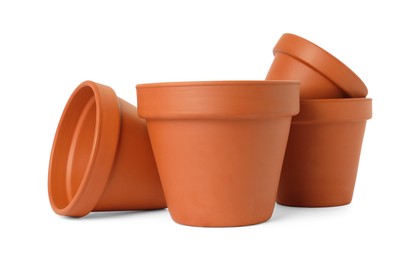 Empty clay flower pots isolated on white