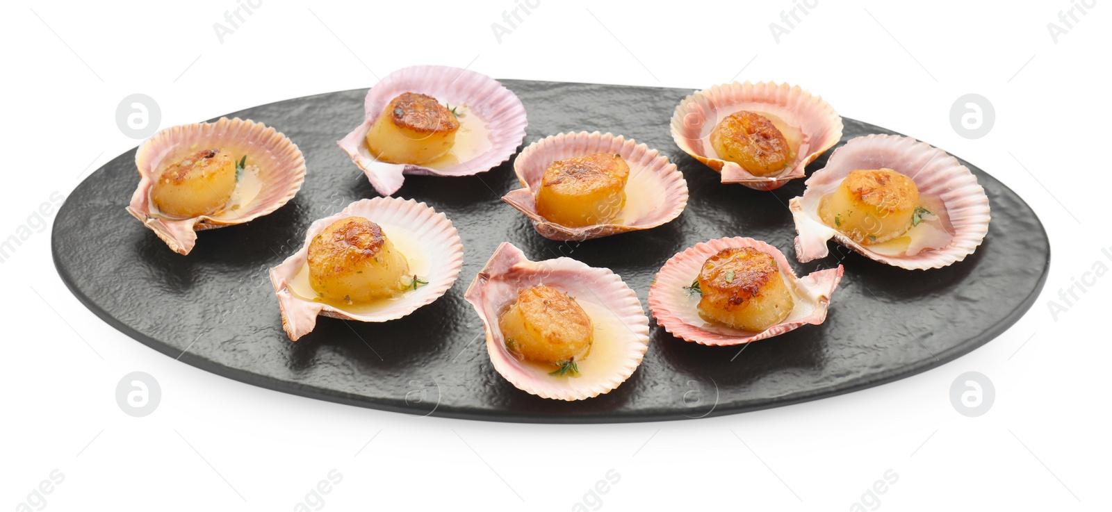 Photo of Delicious fried scallops in shells isolated on white