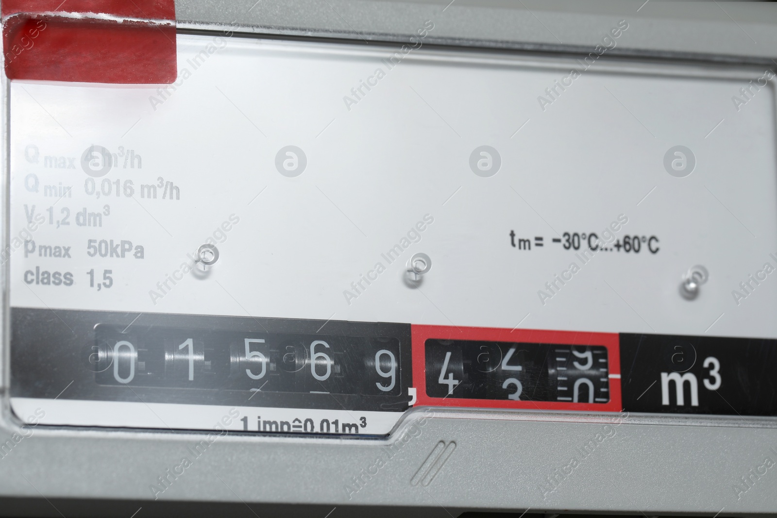 Photo of Electric meter as background, closeup. Gas measuring device