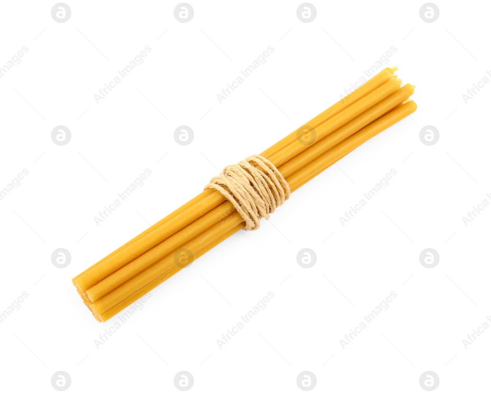 Photo of Bunch of church candles on white background, top view