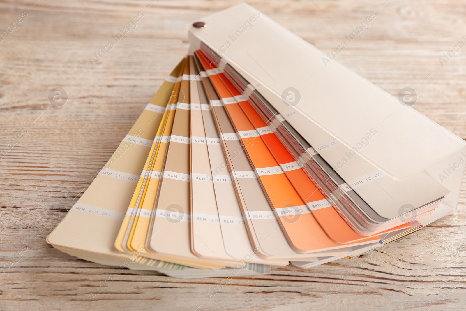 Photo of Color palette samples on wooden background