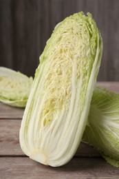 Fresh ripe Chinese cabbages on wooden table