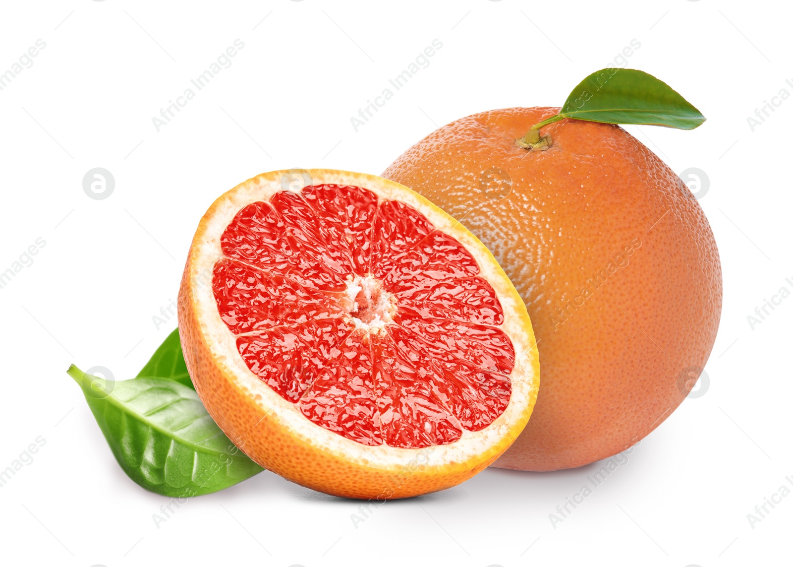 Image of Tasty ripe grapefruits and green leaves on white background