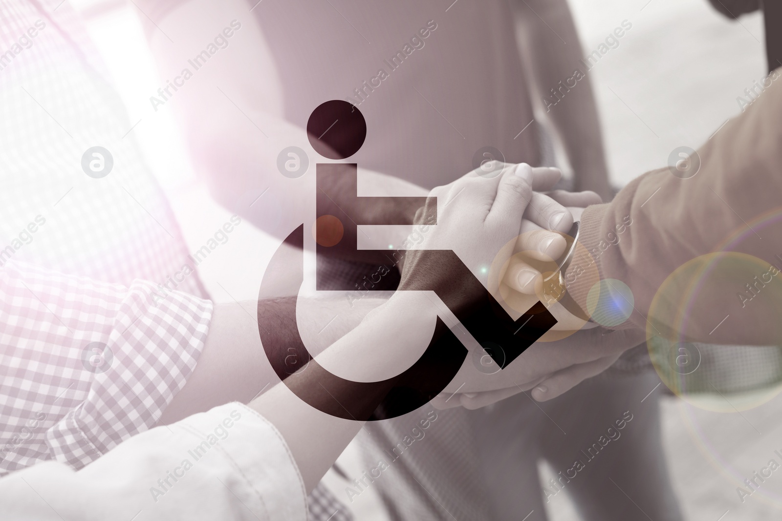 Image of Inclusive workplace culture. International symbol of access. People holding hands together, closeup