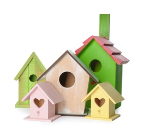 Many different bird houses on white background