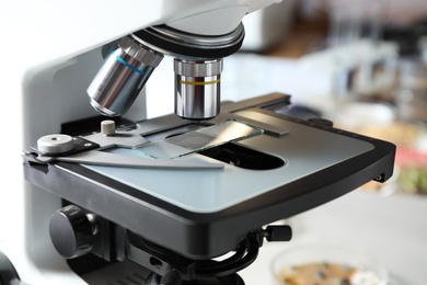 Photo of Modern microscope in laboratory, closeup. Phytopathological analysis