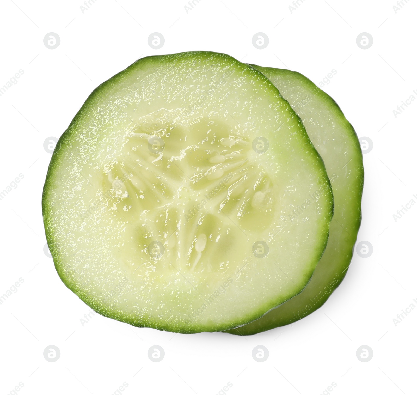 Photo of Slices of fresh cucumber isolated on white, top view