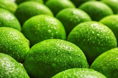 Fresh ripe green limes, closeup