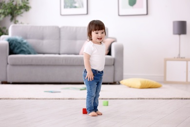 Cute baby girl at home