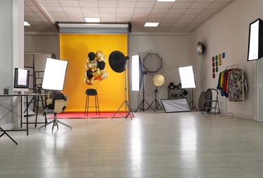 Interior of modern photo studio with professional equipment