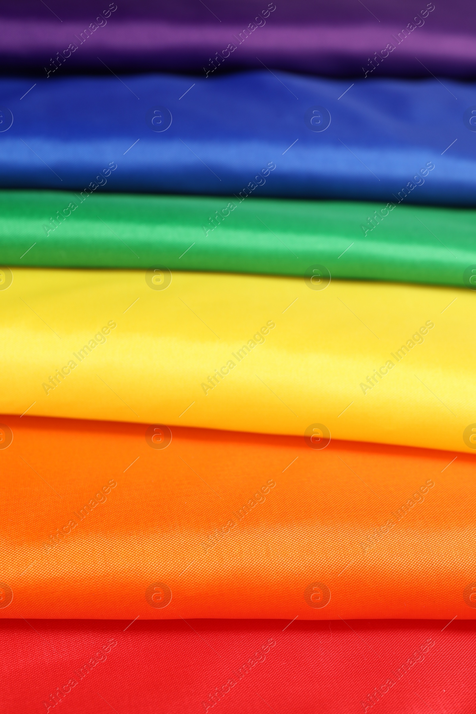 Photo of Rainbow LGBT flag as background, closeup view