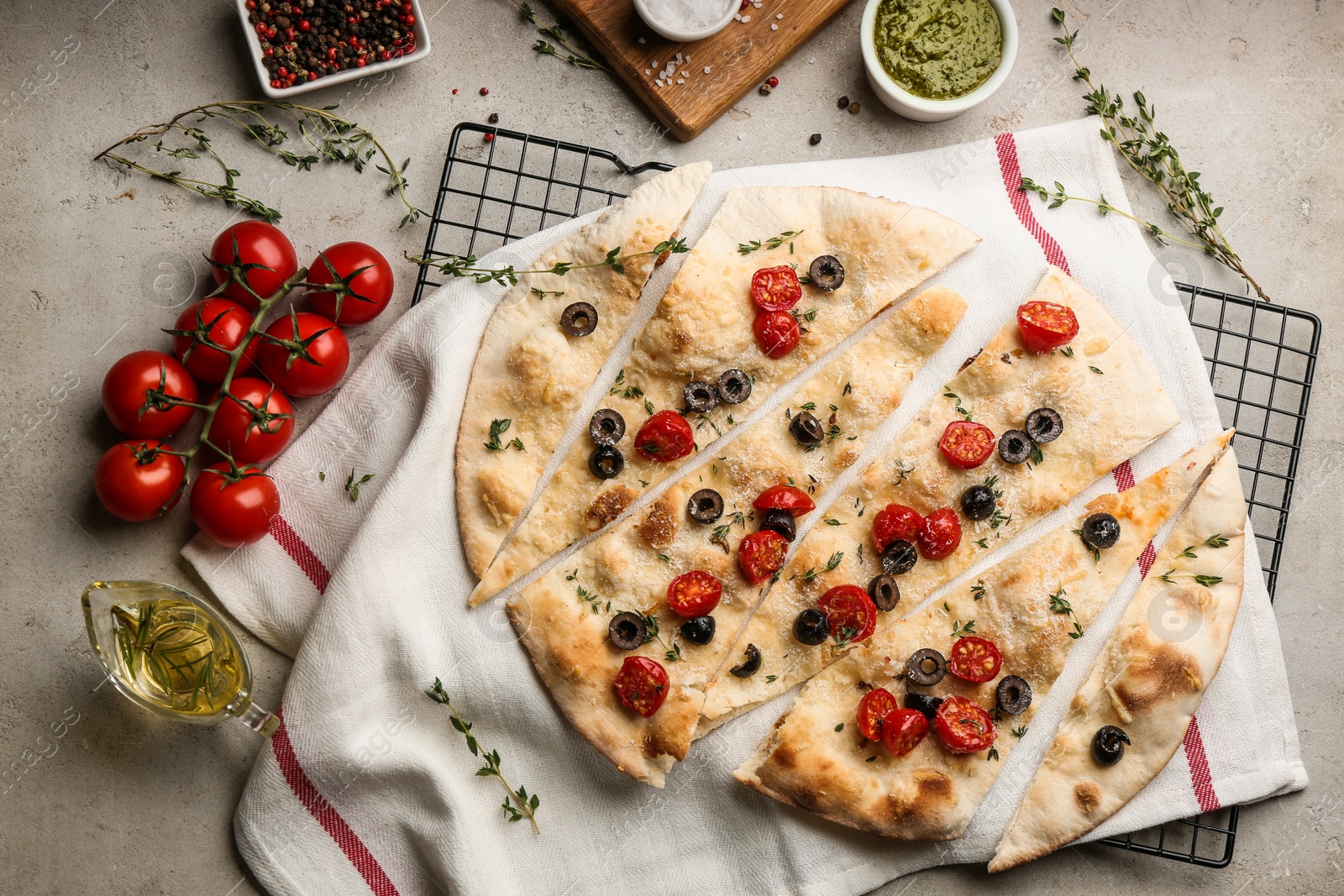 Photo of Flat lay composition with focaccia bread on light grey table