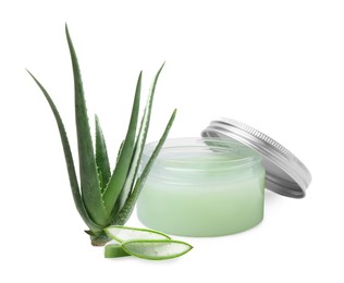 Image of Moisturizing cream with extract of aloe vera. Jar and green aloe leaves on white background