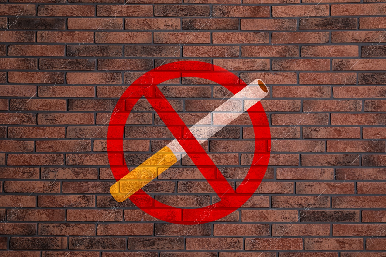 Image of Sign No Smoking drawn on brick wall