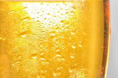 Photo of Glass of tasty beer, closeup. Alcoholic drink