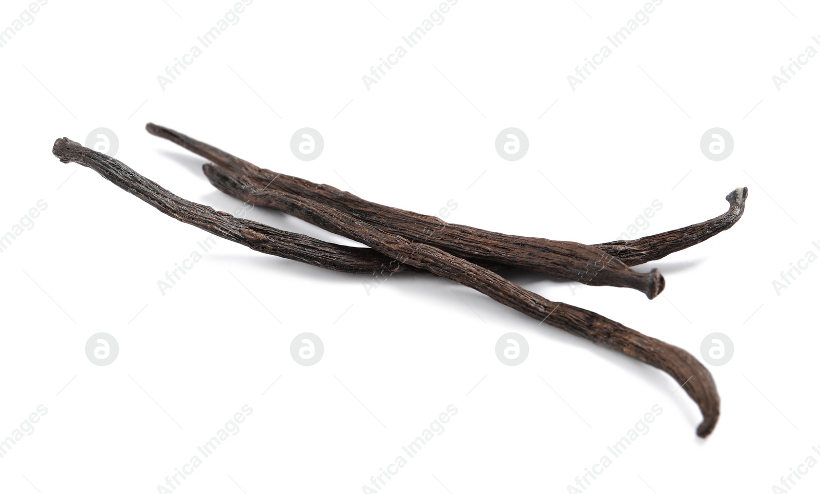 Photo of Dried aromatic vanilla sticks on white background