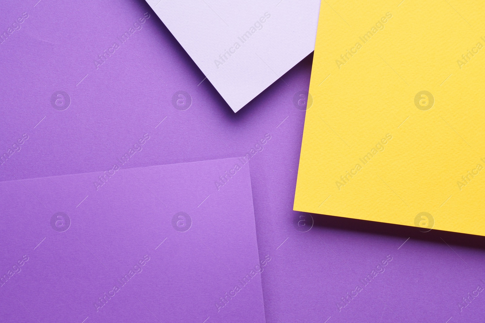 Photo of Colorful paper sheets as background, top view