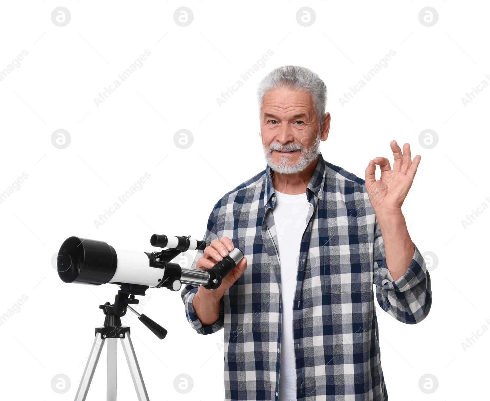 Photo of Senior astronomer with telescope showing okay gesture on white background