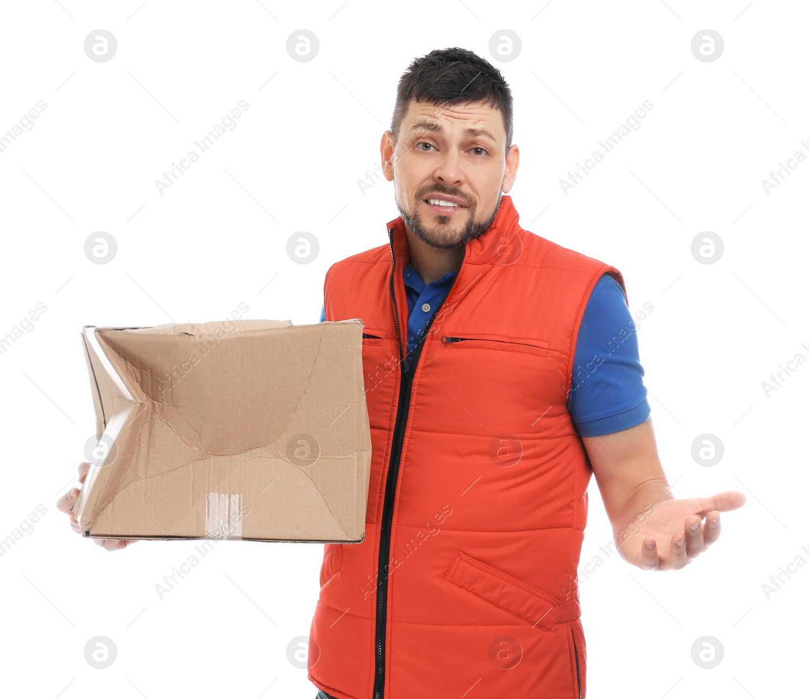 Photo of Emotional courier with damaged cardboard box on white background. Poor quality delivery service