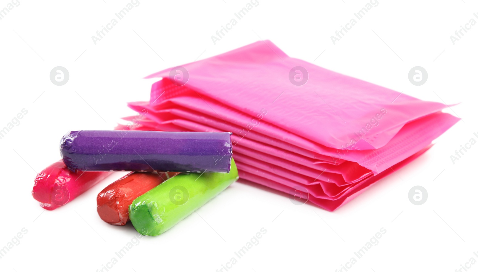 Photo of Pads and tampons on white background. Menstrual hygiene product