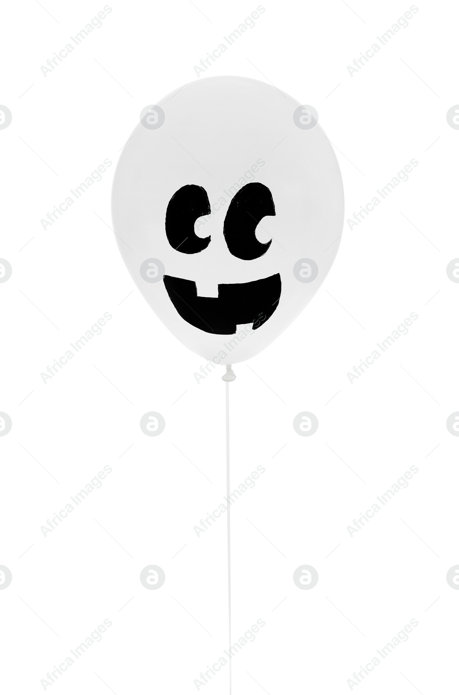 Photo of Balloon with drawing of happy face on white background. Halloween party