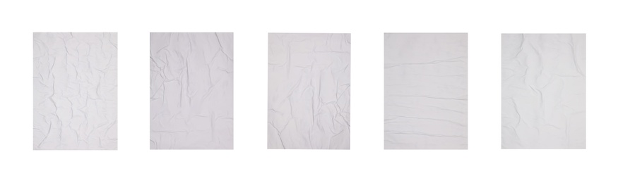 Image of Collection of creased blank posters on white background. Banner design