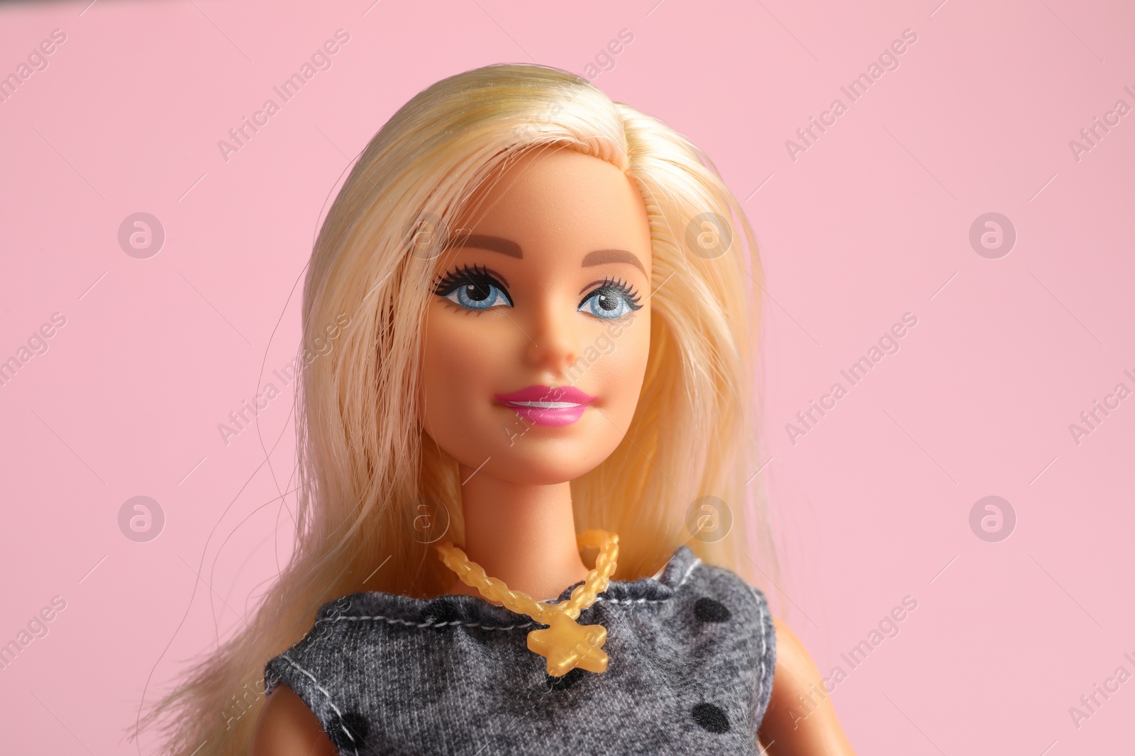 Photo of Mykolaiv, Ukraine - September 2, 2023: Beautiful Barbie doll on pale pink background