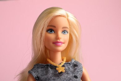 Photo of Mykolaiv, Ukraine - September 2, 2023: Beautiful Barbie doll on pale pink background