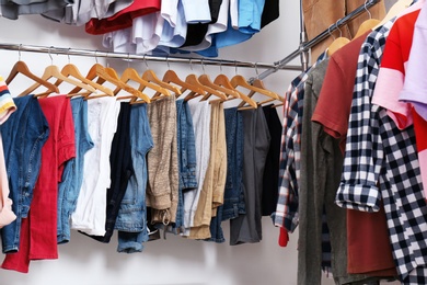 Photo of Modern dressing room with different stylish clothes