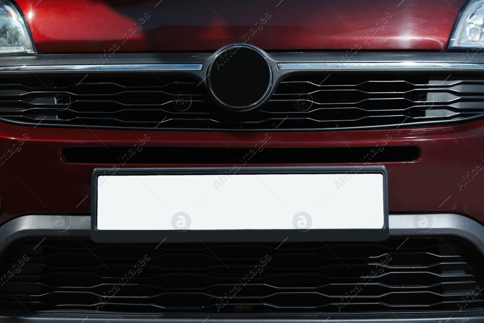 Photo of Car with vehicle registration plate, closeup view