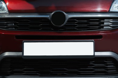 Photo of Car with vehicle registration plate, closeup view