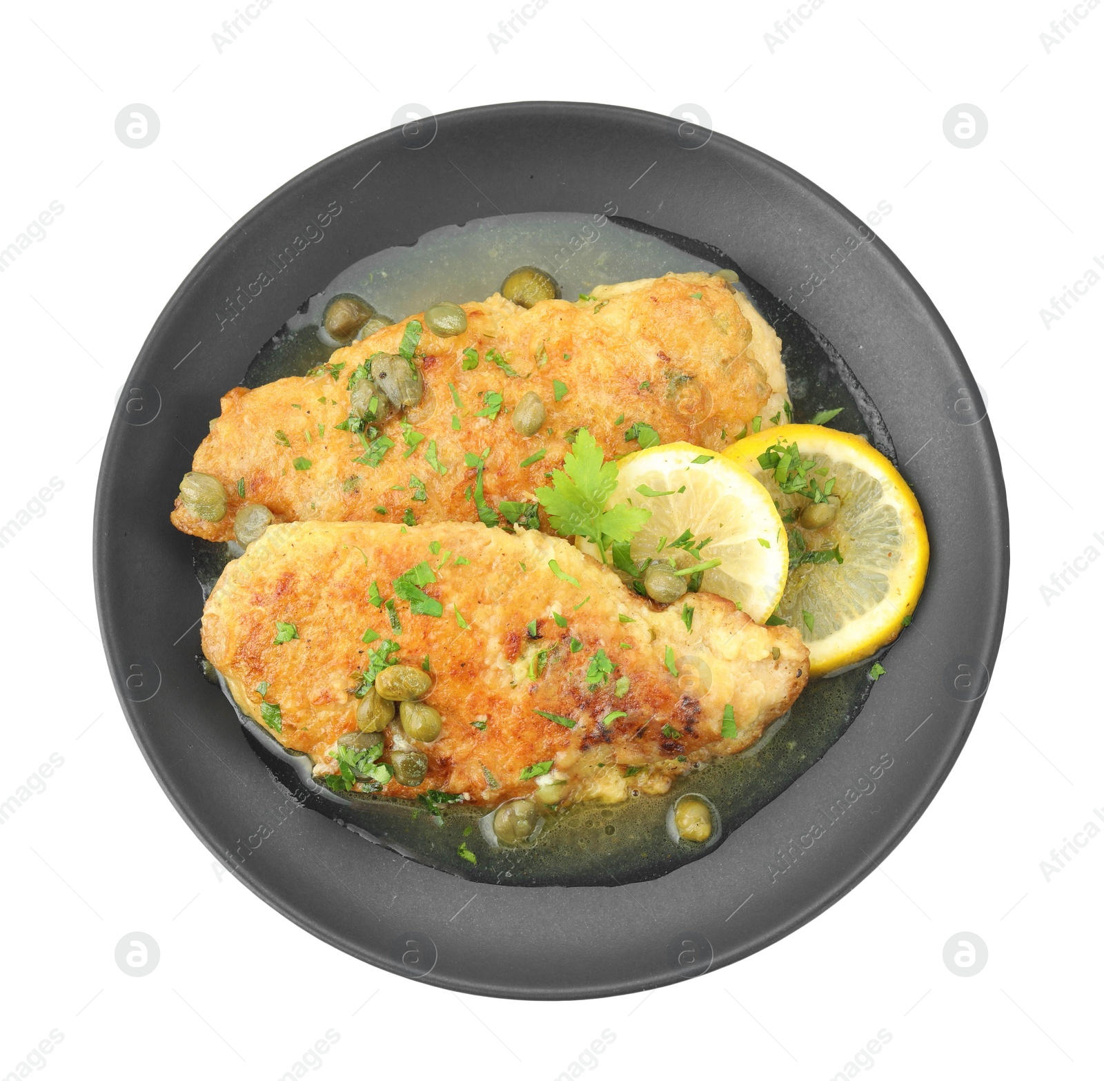 Photo of Delicious chicken piccata with herbs isolated on white, top view