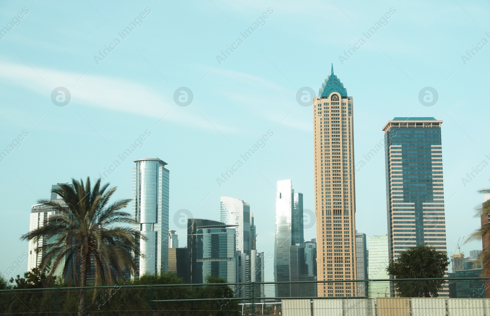 Photo of DUBAI, UNITED ARAB EMIRATES - NOVEMBER 03, 2018: Landscape with different hotels on sunny day