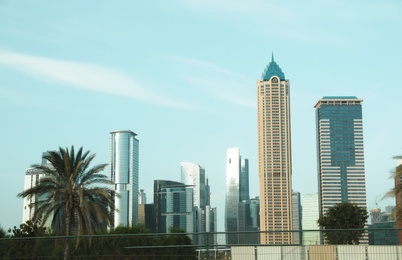 Photo of DUBAI, UNITED ARAB EMIRATES - NOVEMBER 03, 2018: Landscape with different hotels on sunny day